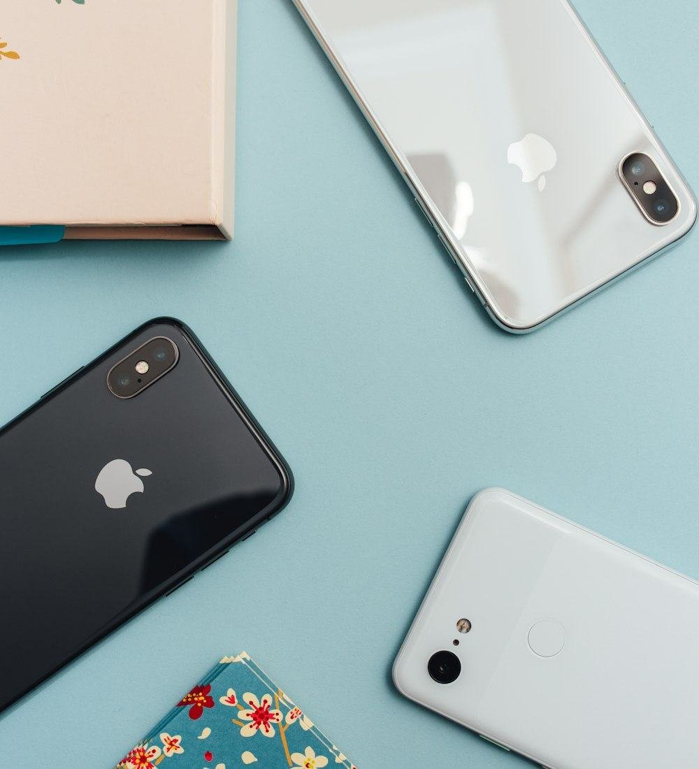 An iPhone and a Google Pixel Android phone side by side